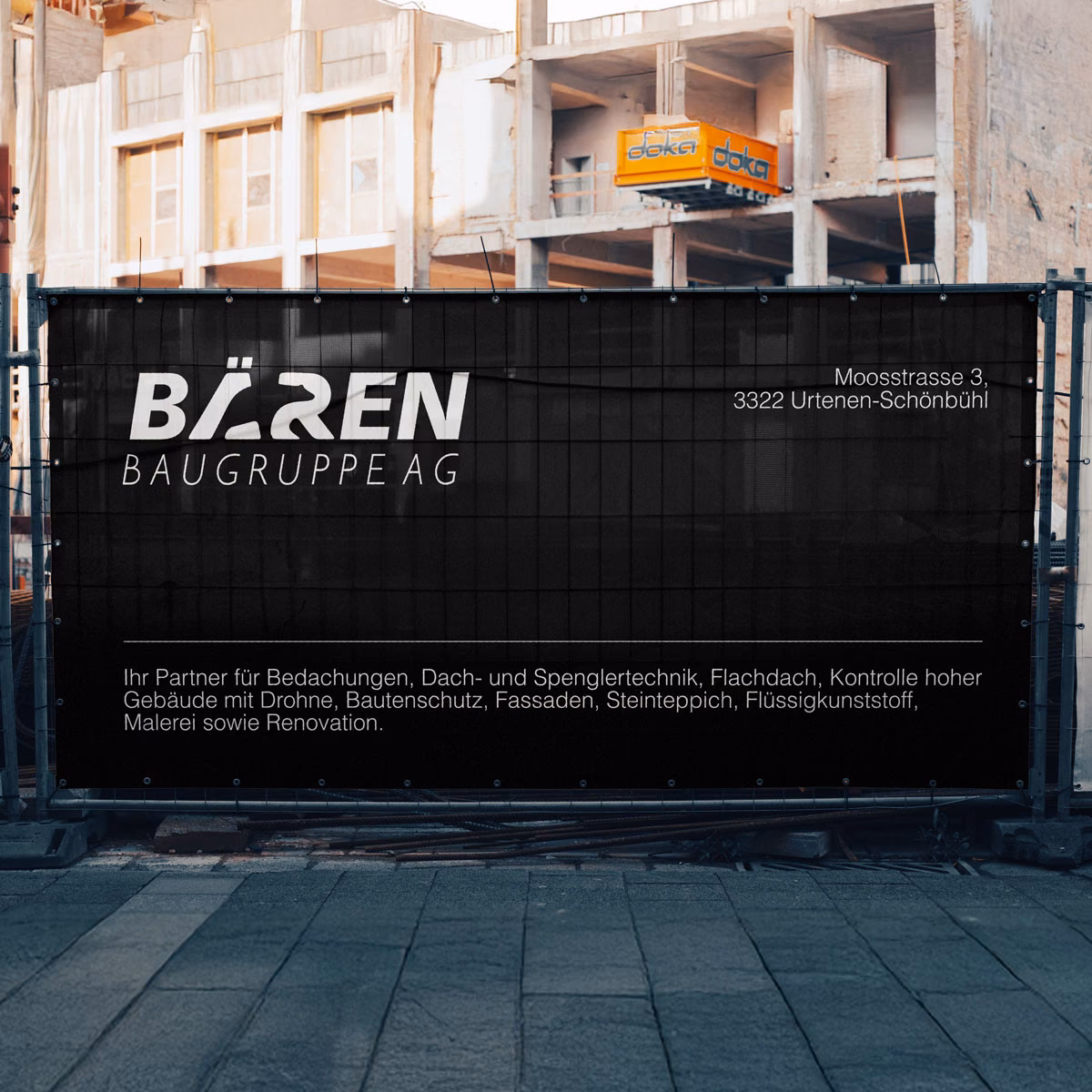 Bären Baugruppe AG site banner on a building-site fence: the white logo on black, the address and the list of services